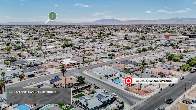 6301 Garwood Ave, Las Vegas, NV 89107 - aerial perspective of suburban area featuring a mountain backdrop