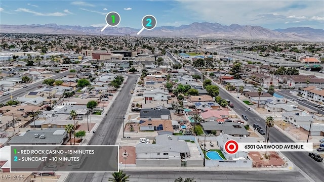 6301 Garwood Ave, Las Vegas, NV 89107 - aerial perspective of suburban area with a mountain backdrop