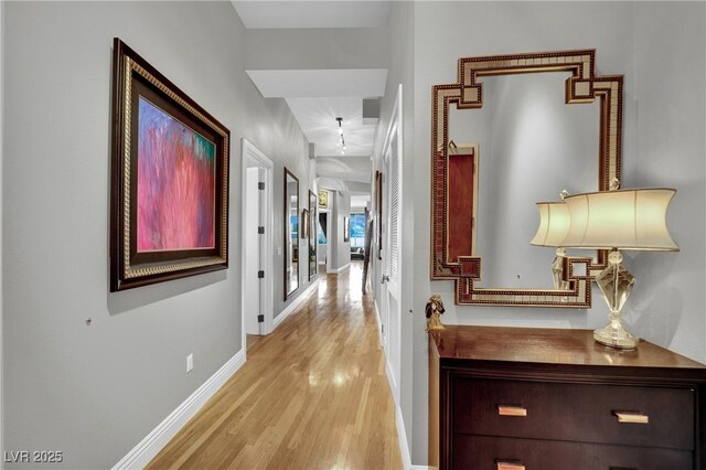 360 E Desert Inn Rd Unit 1803, Las Vegas, NV 89109 - corridor featuring light wood-style flooring and baseboards