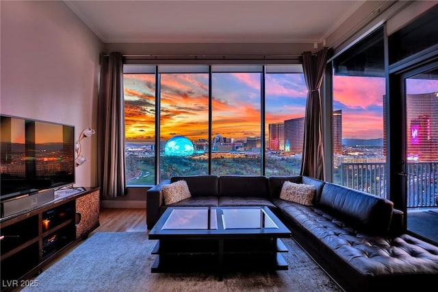 360 E Desert Inn Rd Unit 1803, Las Vegas, NV 89109 - living room featuring wood finished floors, ornamental molding, baseboards, and a city view