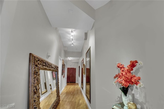 360 E Desert Inn Rd Unit 1803, Las Vegas, NV 89109 - corridor with light wood-style flooring and baseboards