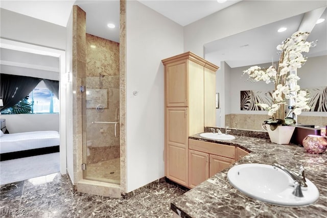 360 E Desert Inn Rd Unit 1803, Las Vegas, NV 89109 - ensuite bathroom with marble tiled floors, a stall shower, and double vanity