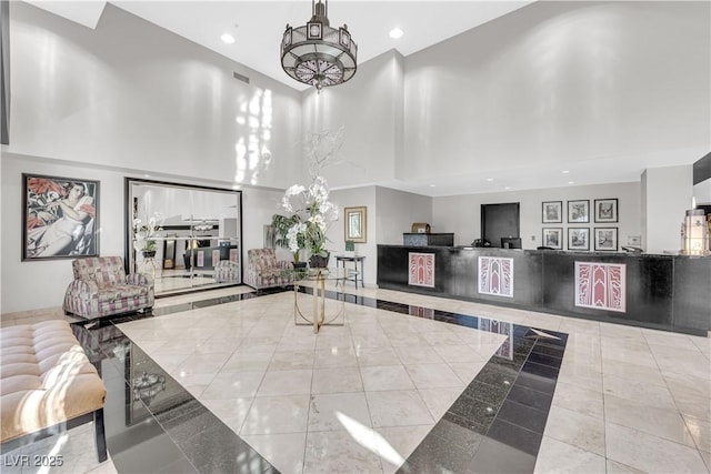 360 E Desert Inn Rd Unit 1803, Las Vegas, NV 89109 - building lobby featuring a high ceiling and recessed lighting