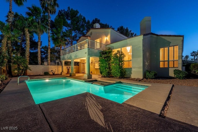 2104 Inverness Dr, Henderson, NV 89074 - pool at twilight featuring a patio and an in-ground hot tub