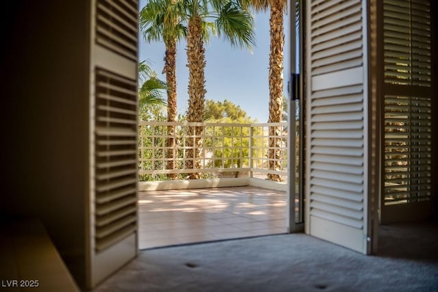 2104 Inverness Dr, Henderson, NV 89074 - doorway featuring carpet floors and tile patterned flooring