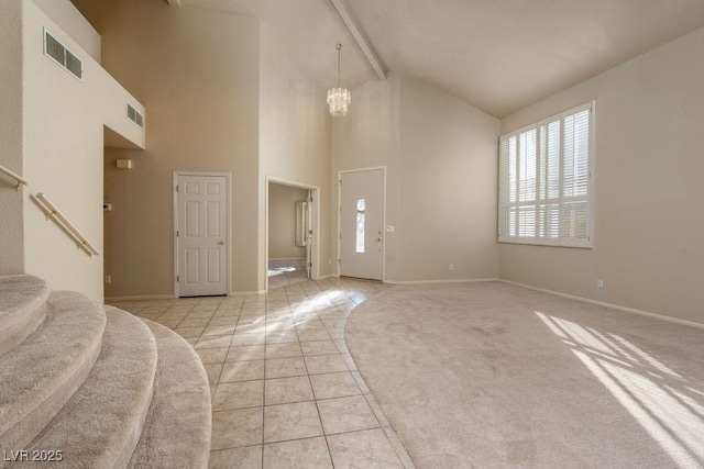 2104 Inverness Dr, Henderson, NV 89074 - entryway featuring high vaulted ceiling, beam ceiling, healthy amount of natural light, stairway, and a chandelier