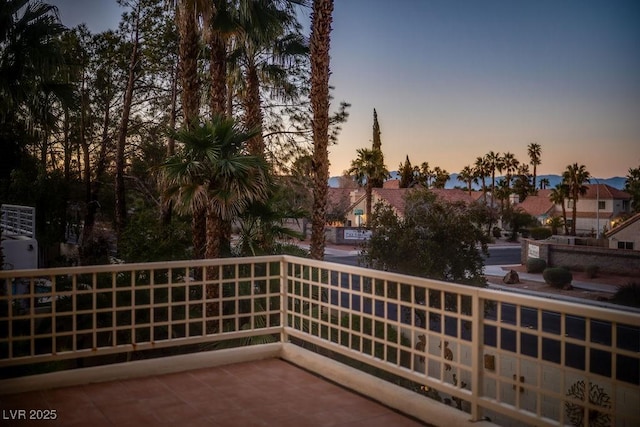 2104 Inverness Dr, Henderson, NV 89074 - balcony at dusk with a residential view