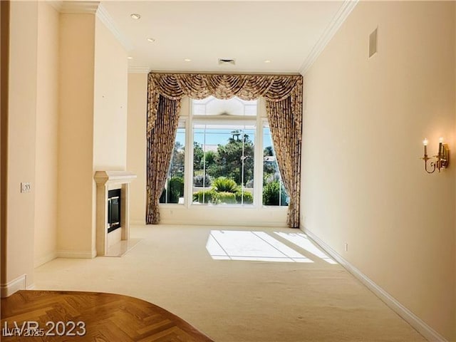 2017 Eagle Trace Way, Las Vegas, NV 89117 - unfurnished living room featuring crown molding, baseboards, a fireplace with flush hearth, and carpet floors