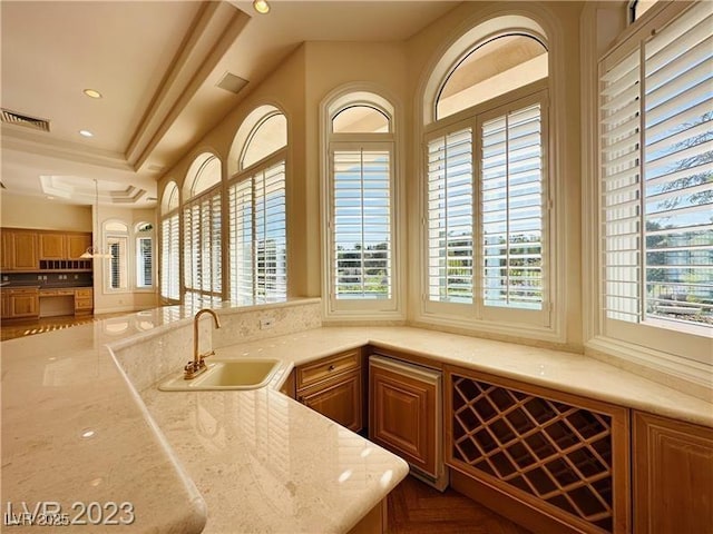 2017 Eagle Trace Way, Las Vegas, NV 89117 - bar with a sink, plenty of natural light, recessed lighting, and a tray ceiling