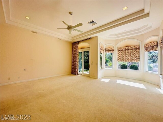 2017 Eagle Trace Way, Las Vegas, NV 89117 - empty room featuring a tray ceiling, carpet, ceiling fan, baseboards, and recessed lighting