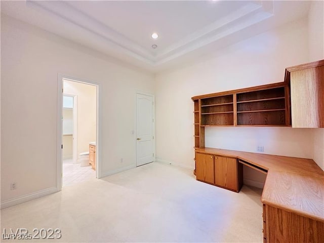 2017 Eagle Trace Way, Las Vegas, NV 89117 - unfurnished office with built in study area, a tray ceiling, light carpet, baseboards, and recessed lighting