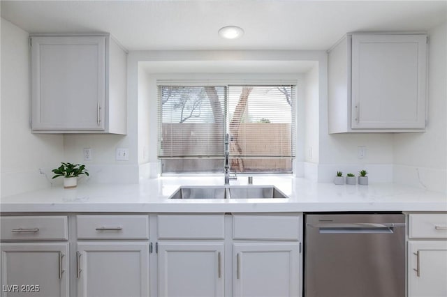 92 Sea Holly Way, Henderson, NV 89074 - kitchen with stainless steel dishwasher, light countertops, white cabinetry, and recessed lighting