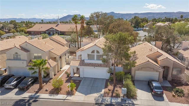 92 Sea Holly Way, Henderson, NV 89074 - aerial view of residential area featuring a mountain backdrop
