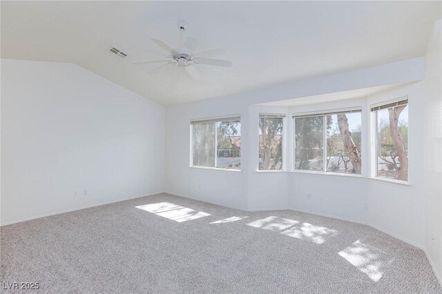 92 Sea Holly Way, Henderson, NV 89074 - unfurnished room with carpet floors, a ceiling fan, and vaulted ceiling