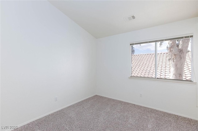 92 Sea Holly Way, Henderson, NV 89074 - carpeted spare room with baseboards and lofted ceiling