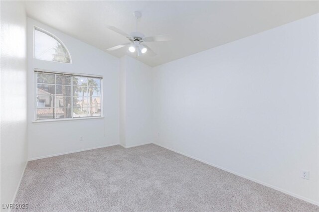 92 Sea Holly Way, Henderson, NV 89074 - carpeted spare room featuring ceiling fan and vaulted ceiling