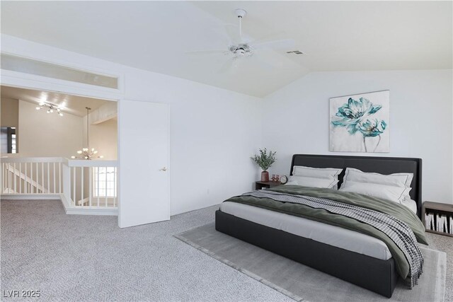 92 Sea Holly Way, Henderson, NV 89074 - bedroom featuring lofted ceiling, a chandelier, carpet floors, multiple windows, and ceiling fan