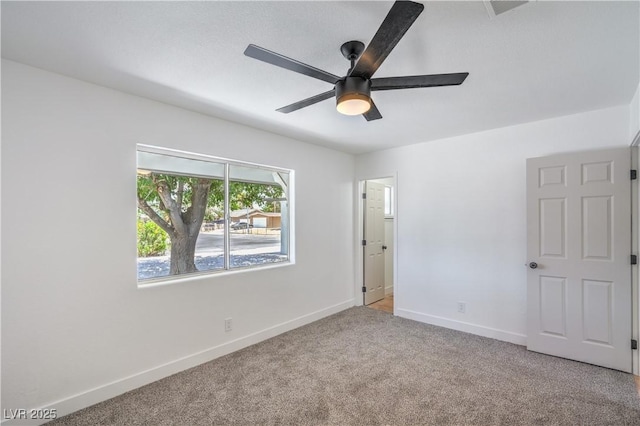 5279 Consul Ave, Las Vegas, NV 89142 - unfurnished bedroom with carpet floors, baseboards, and a ceiling fan
