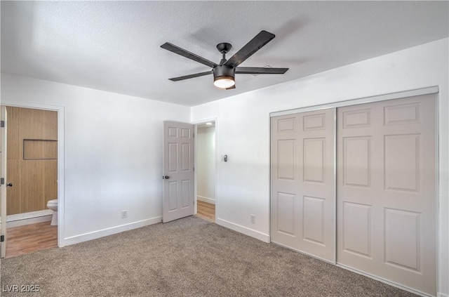 5279 Consul Ave, Las Vegas, NV 89142 - unfurnished bedroom with carpet, baseboards, a closet, ensuite bathroom, and ceiling fan