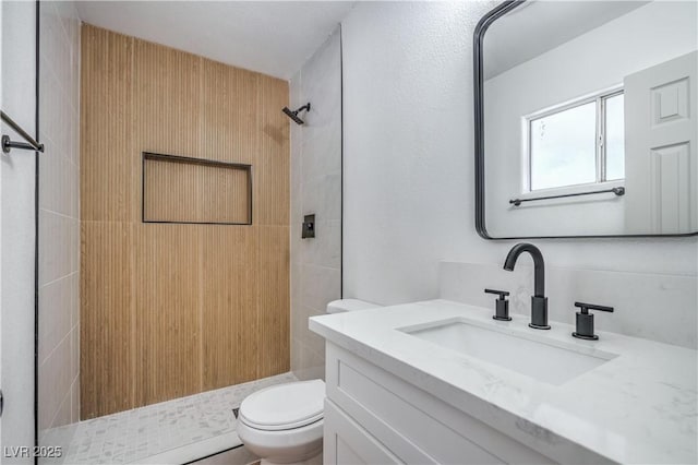 5279 Consul Ave, Las Vegas, NV 89142 - bathroom featuring toilet, vanity, and a stall shower