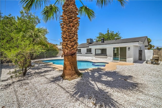 5279 Consul Ave, Las Vegas, NV 89142 - view of pool with a patio area, central AC, and a pool with connected hot tub