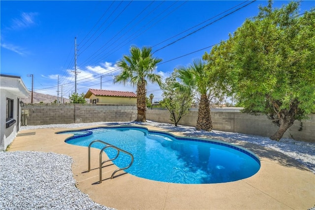 5279 Consul Ave, Las Vegas, NV 89142 - view of pool with a fenced backyard, a patio, and a pool with connected hot tub