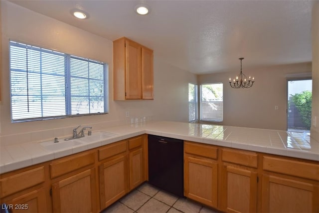 1220 Padre Serra Ln, Las Vegas, NV 89134 - kitchen featuring black dishwasher, a sink, a peninsula, a chandelier, and light tile patterned floors