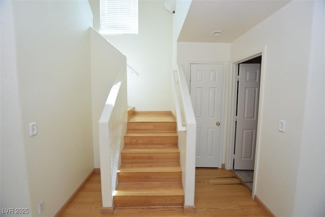 1220 Padre Serra Ln, Las Vegas, NV 89134 - stairway featuring wood finished floors and baseboards