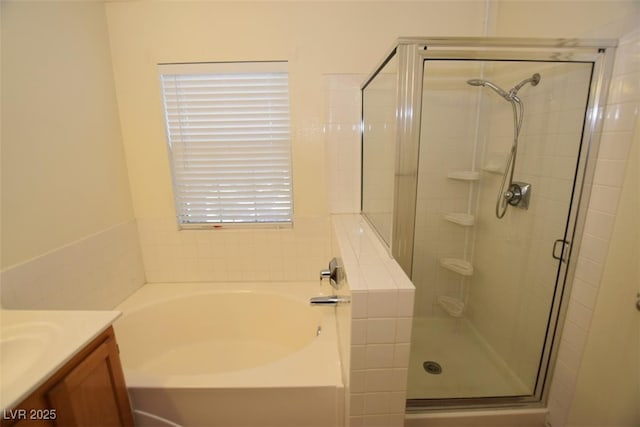 1220 Padre Serra Ln, Las Vegas, NV 89134 - full bathroom with a garden tub, vanity, and a shower stall