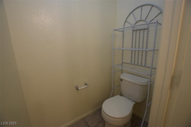 1220 Padre Serra Ln, Las Vegas, NV 89134 - bathroom featuring toilet, baseboards, and tile patterned floors