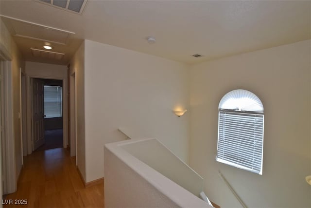 1220 Padre Serra Ln, Las Vegas, NV 89134 - hall with an upstairs landing, light wood finished floors, and baseboards