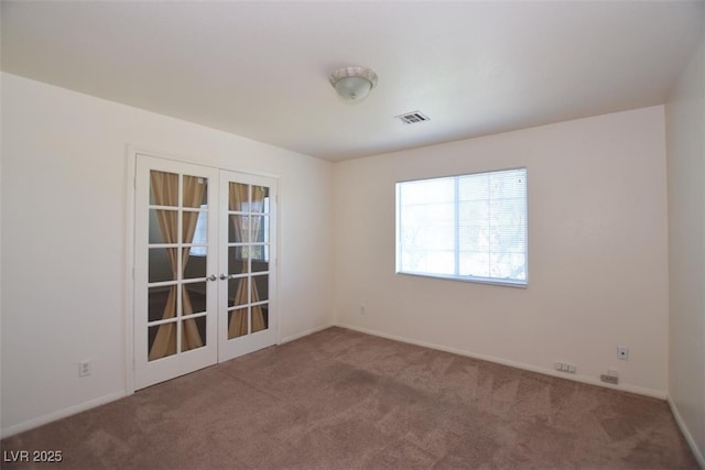 1220 Padre Serra Ln, Las Vegas, NV 89134 - carpeted empty room with french doors and baseboards