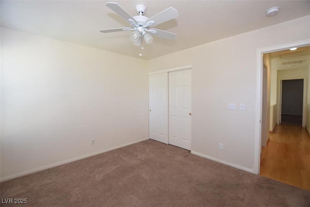 1220 Padre Serra Ln, Las Vegas, NV 89134 - unfurnished bedroom featuring carpet floors, a closet, baseboards, and a ceiling fan