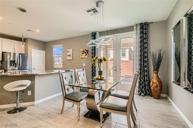 2806 Calle Cadiz, Henderson, NV 89044 - dining space with french doors, baseboards, and recessed lighting