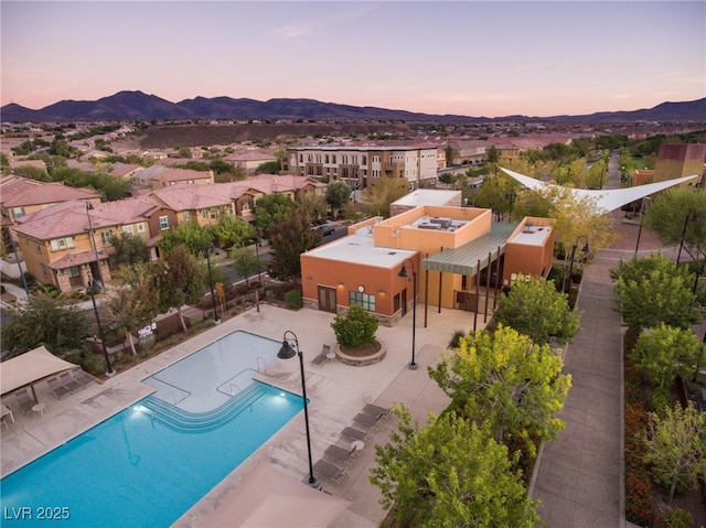2806 Calle Cadiz, Henderson, NV 89044 - community pool with a mountain view, a patio, and a residential view