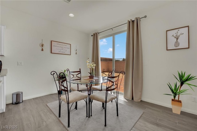 10345 Zebra Swallowtail St, Las Vegas, NV 89141 - dining area with light wood-type flooring, baseboards, and recessed lighting