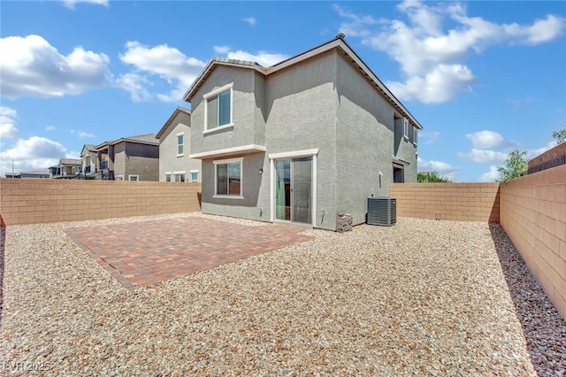 10345 Zebra Swallowtail St, Las Vegas, NV 89141 - rear view of property with stucco siding, a fenced backyard, a patio area, and cooling unit