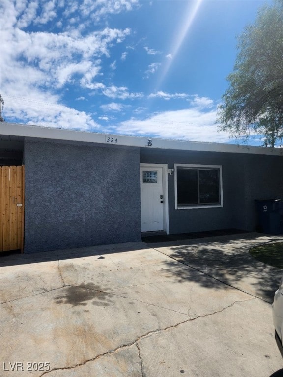 324 Princeton St, Las Vegas, NV 89107 - entrance to property featuring stucco siding
