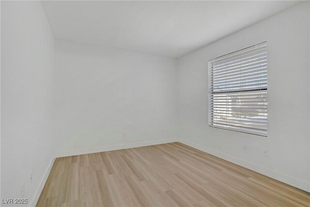 5171 Lindell Rd Unit 201, Las Vegas, NV 89118 - spare room featuring light wood finished floors and baseboards