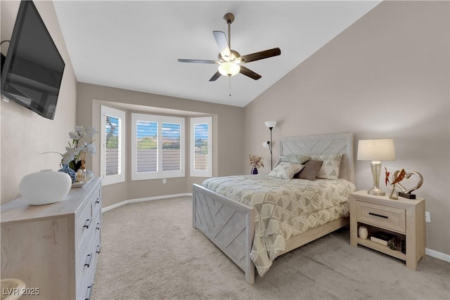 2701 Glencliff Dr, Las Vegas, NV 89134 - bedroom featuring light colored carpet, vaulted ceiling, baseboards, and ceiling fan
