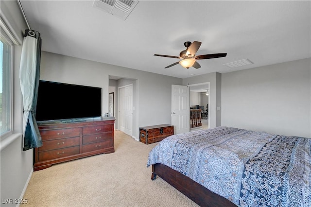 405 Prairie Moon Ave, North Las Vegas, NV 89084 - carpeted bedroom featuring multiple windows, a ceiling fan, and baseboards