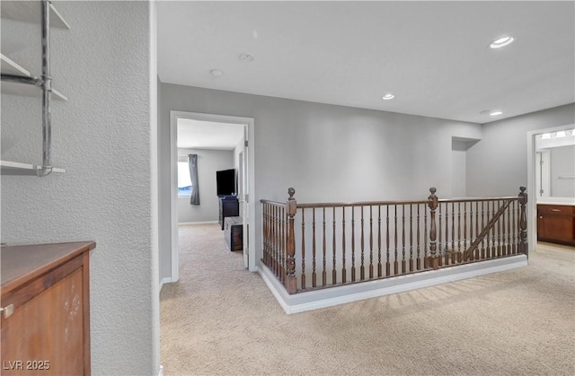 405 Prairie Moon Ave, North Las Vegas, NV 89084 - hall with carpet floors, an upstairs landing, recessed lighting, and baseboards
