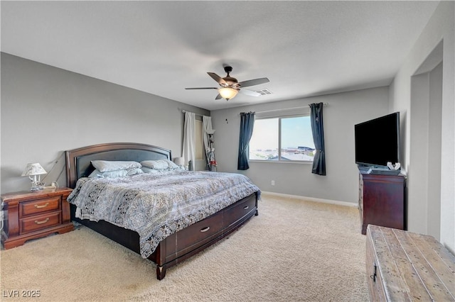 405 Prairie Moon Ave, North Las Vegas, NV 89084 - bedroom with light carpet, baseboards, and ceiling fan