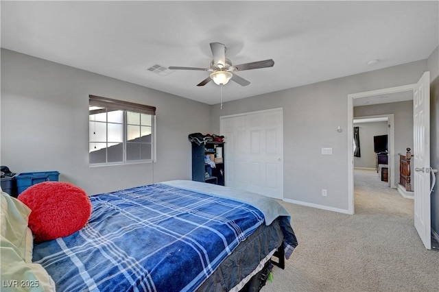 405 Prairie Moon Ave, North Las Vegas, NV 89084 - carpeted bedroom featuring baseboards, a ceiling fan, and a closet