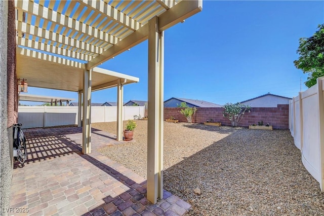 405 Prairie Moon Ave, North Las Vegas, NV 89084 - fenced backyard with a patio and a pergola