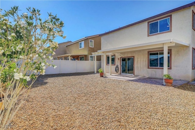 405 Prairie Moon Ave, North Las Vegas, NV 89084 - rear view of house with a patio area and stucco siding