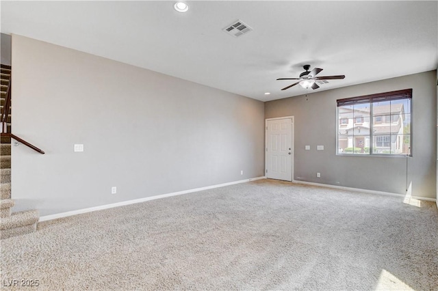 405 Prairie Moon Ave, North Las Vegas, NV 89084 - spare room featuring stairway, light colored carpet, a ceiling fan, and recessed lighting
