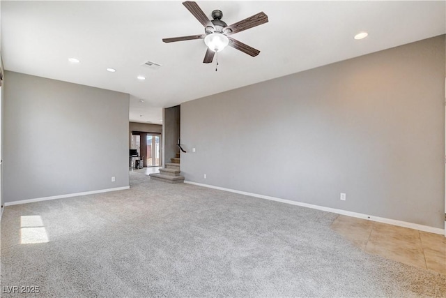 405 Prairie Moon Ave, North Las Vegas, NV 89084 - spare room featuring a ceiling fan, stairway, recessed lighting, and light colored carpet