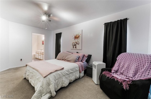3420 Winterhaven St Unit 202, Las Vegas, NV 89108 - bedroom with light colored carpet, ensuite bathroom, ceiling fan, and baseboards