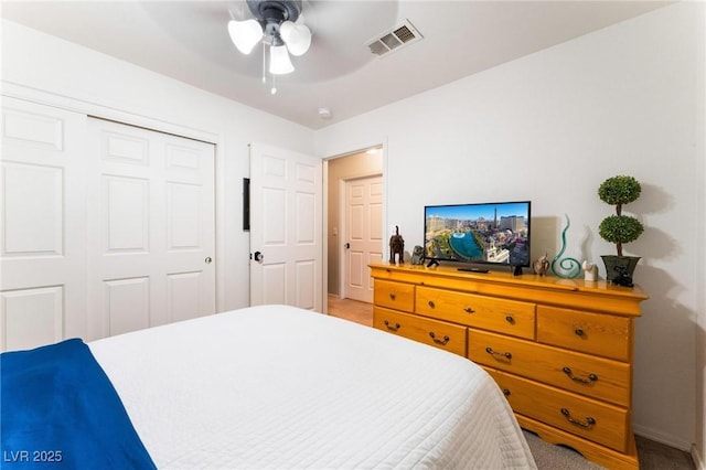 3420 Winterhaven St Unit 202, Las Vegas, NV 89108 - bedroom with light carpet, a closet, baseboards, and a ceiling fan